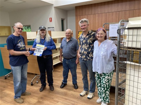 people standing and smiling