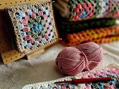 wool and a crochet square