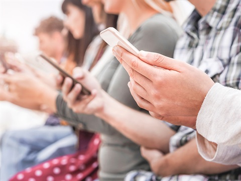 people holding a phone