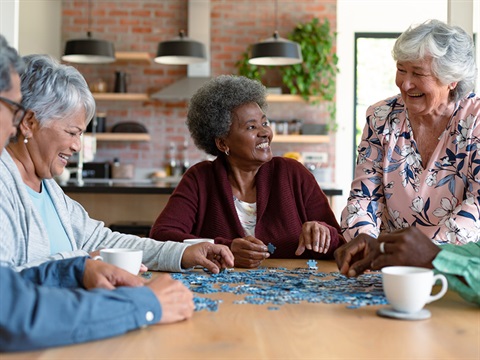 four women laughing