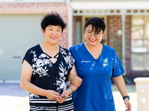 two ladies smiling