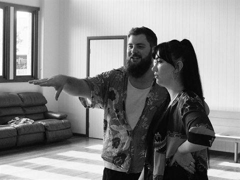 two people looking into the distance