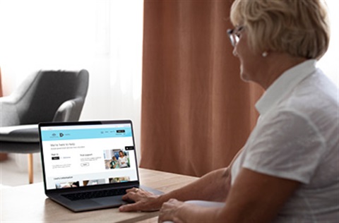 lady sitting down with her laptop