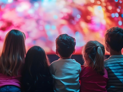 kids looking at a screen