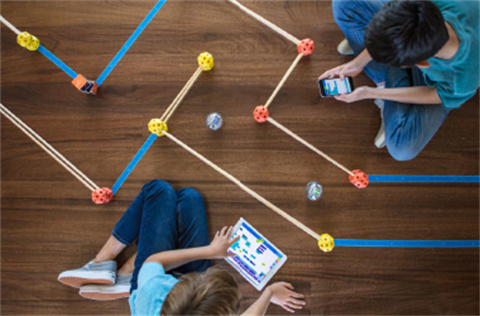 Two children play a game