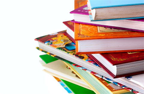 A stack of vibrant books on a plain white background.